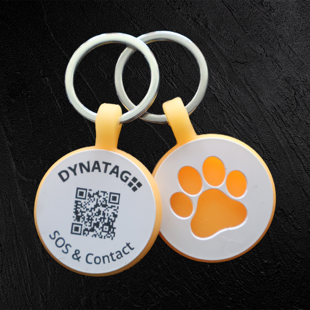 Medaglietta rotonda per animali in silicone fluorescente con codice QR e zampa luminosa – piattaforma dati svizzera