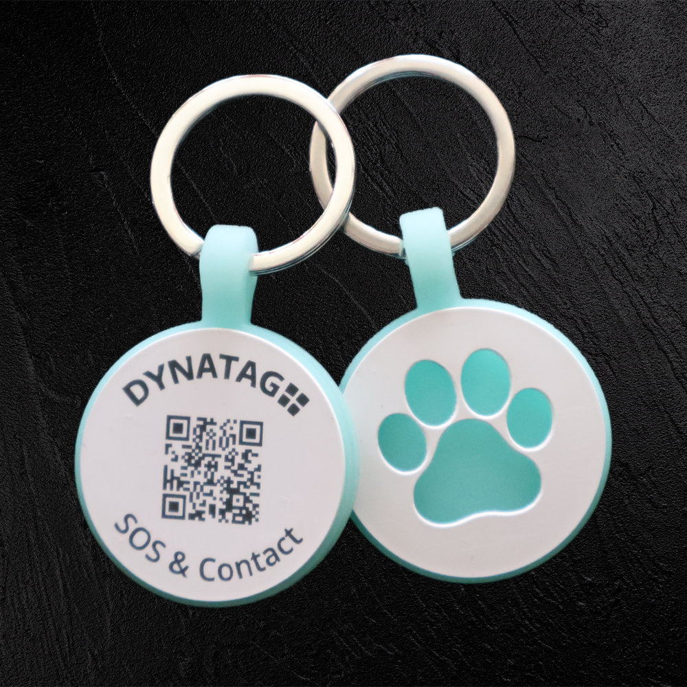 Medaglietta rotonda per animali in silicone fluorescente con codice QR e zampa luminosa – piattaforma dati svizzera