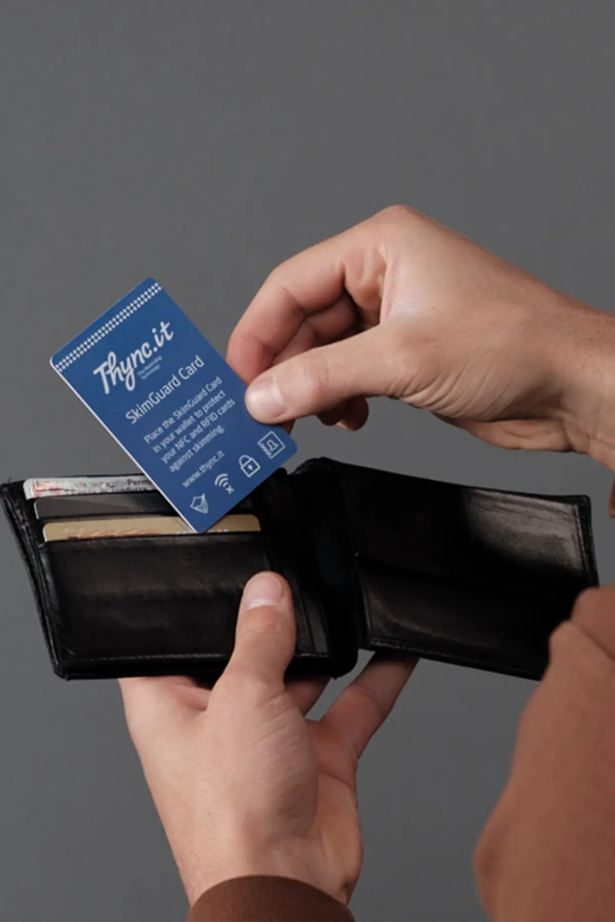Correct placement of the SkimGuard SOS Card alongside contactless payment cards